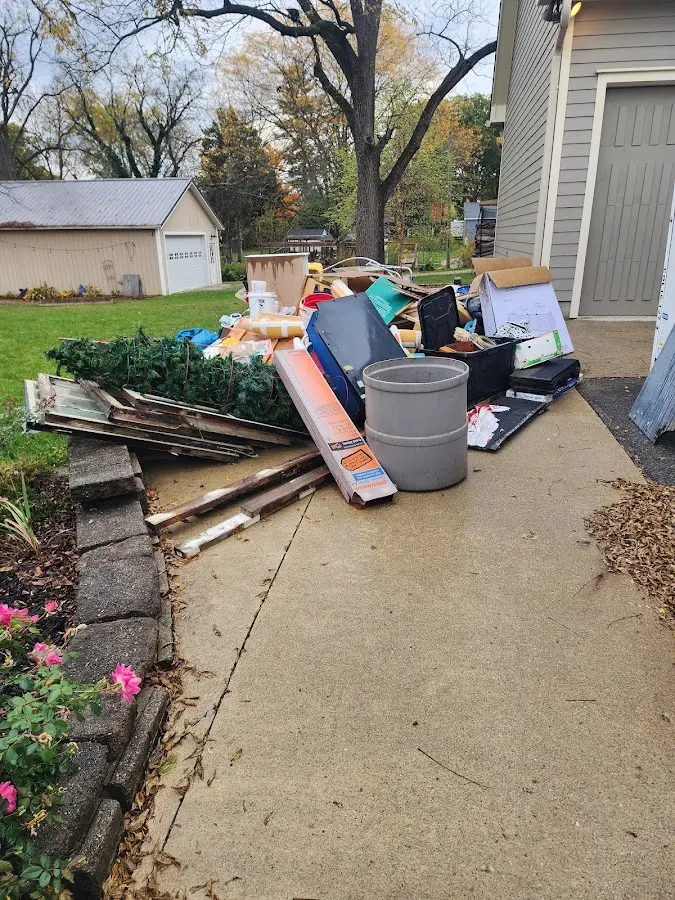Dumpster being loaded with debris for Demolition Dumpster Rental in Catasauqua